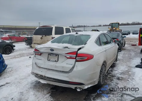 2018 Ford Fusion Hybrid Titanium z USA, uszkodzony, nr VIN 3FA6P0RU6JR219080